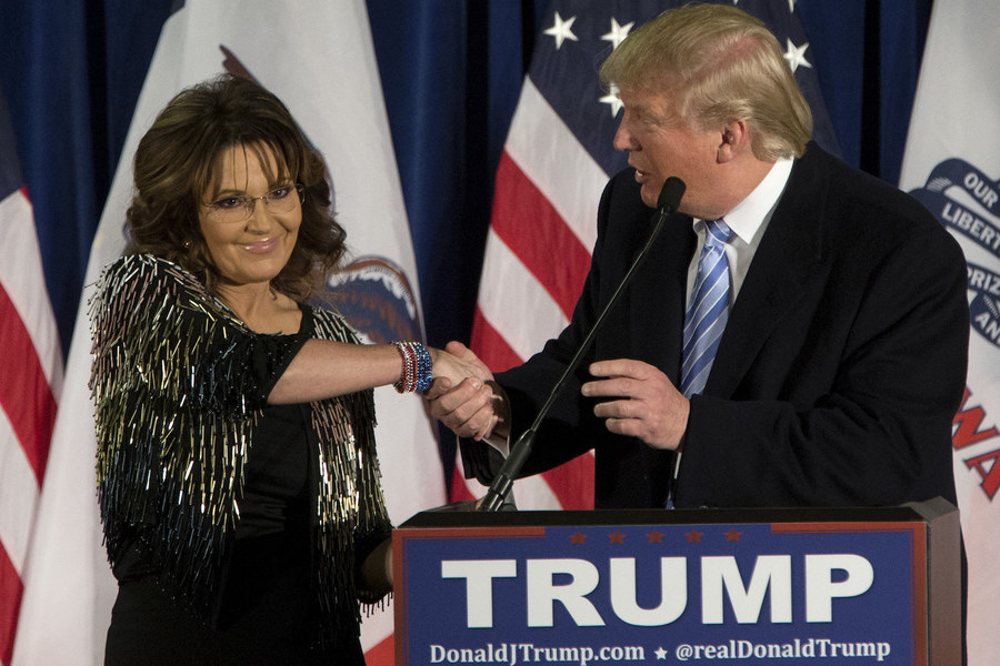 AMES, IA - JANUARY 19:   Republican presidential candidate Donald Trump shakes hands with former Alaska Gov. Sarah Palin at Hansen Agriculture Student Learning Center at Iowa State University on January 19, 2016 in Ames, IA. Trump received Palin's endorsement at the event.  (Photo by Aaron P. Bernstein/Getty Images)