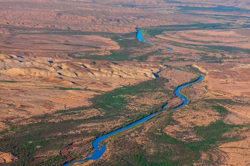 Aerial view taken over Big Bend National Park, Texas USA looking to the Rio Grande River, which is the border between the U.S. and Mexico. Mexico is on the left side of the river.